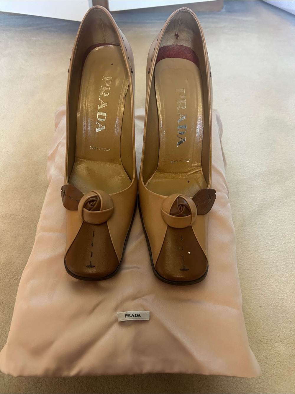 Prada Two-Tone Beige and Brown Leather Heels with Rosette Detail
